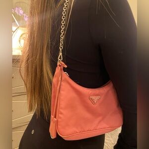 Prada re-edition 2005 crossbody bag in Pink (sold out everywhere)